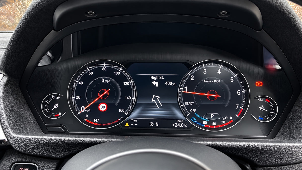 Close-up of BMW 6WB digital instrument cluster