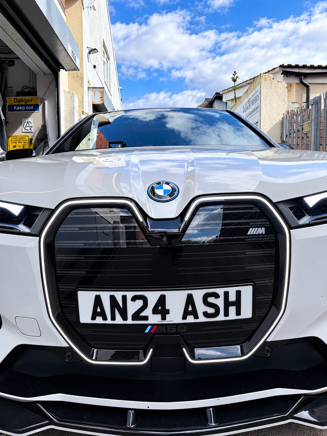 BMW iX Iconic Glow illuminated kidney grille retrofit fitted to white BMW iX